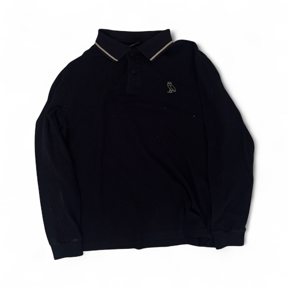 OVO Black Garment with Gold Owl Emblem